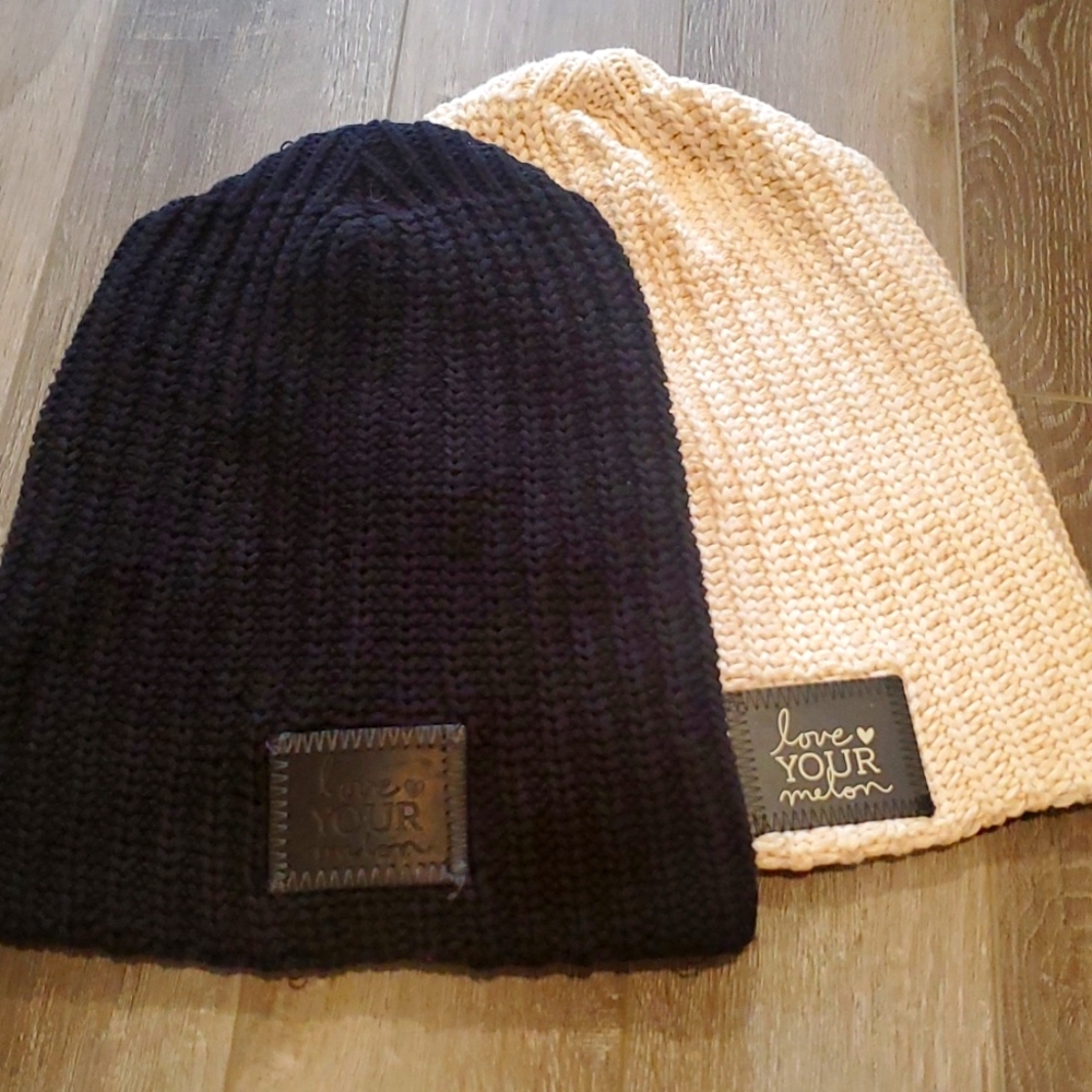 2 black and white Love Your Melon beanies